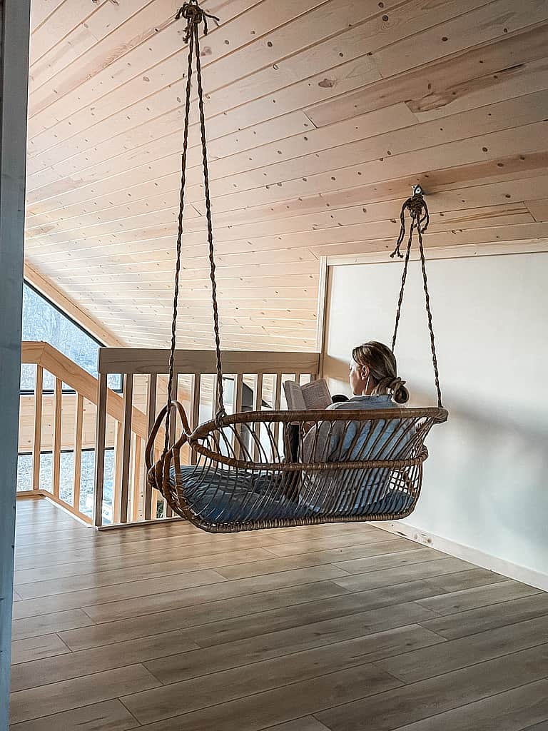 sitting on hanging chair